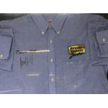 A Damon Hill shirt with Benson & Hedges Jordan embodied badge signed by Damond Hill.