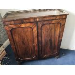 A William IV Mahogany cabinet the top with a raise