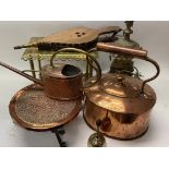 A collection of brass and copper items including a