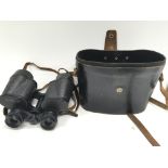 A set of USSR made binoculars including case.