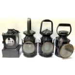 4 Antique Railway lanterns to include 1 LNER square body lantern, 2 Military issue signal lamps