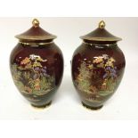 A pair of Crown Devon Rouge Royale vases and cover