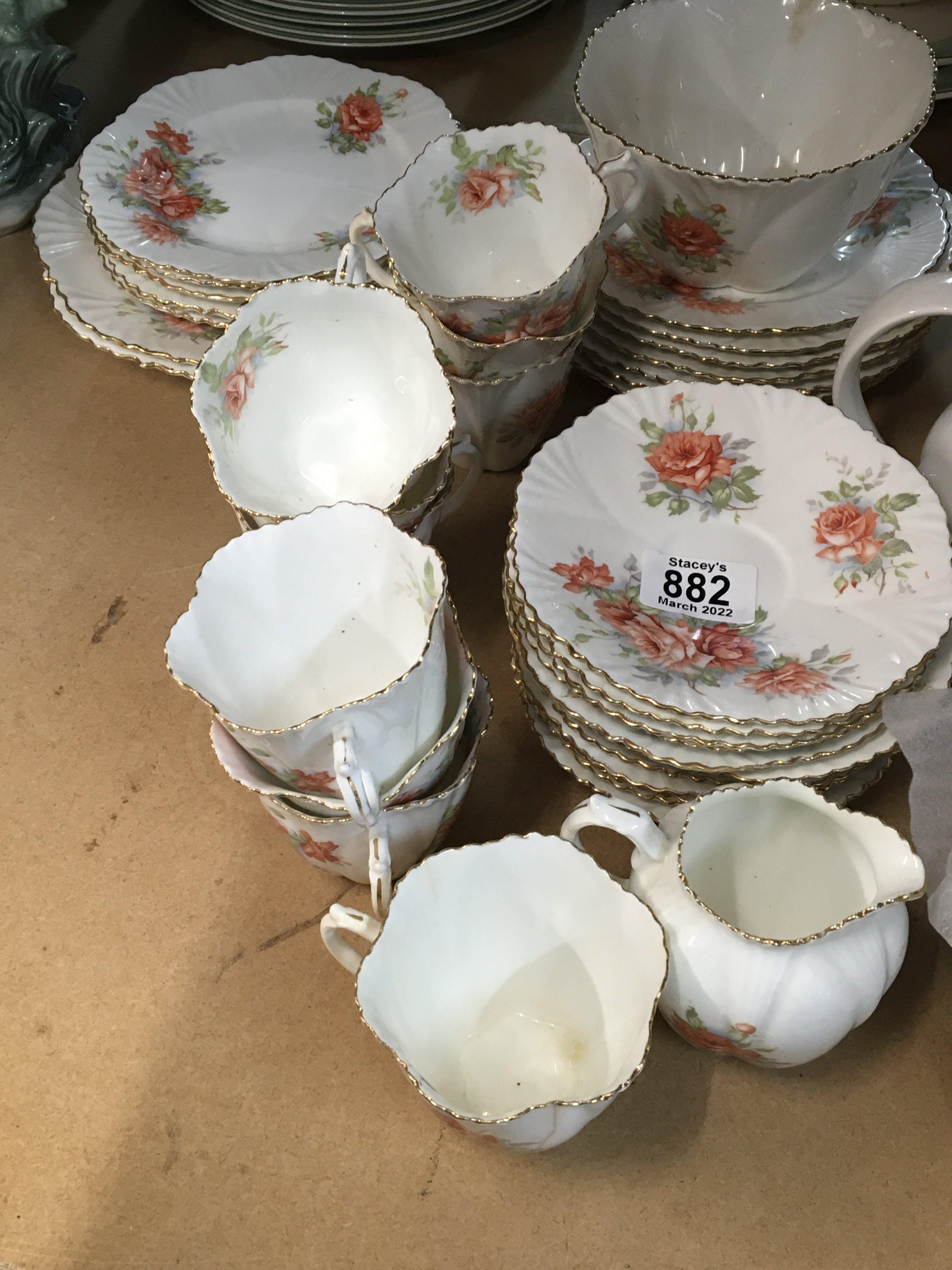 A late Victorian China tea set decorated with rose