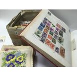A Album of stamps collection of cigarette cards. N