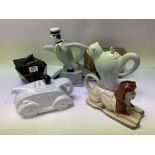 5 novelty teapots ( 1 damaged) together with a Guinness gift set