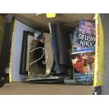 A box containing mixed books and other oddments a