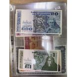A collection of Irish and Scottish banknotes most