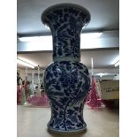 A Chinese blue and white vase decorated with Phoen