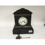 A black slate and Marble Victorian clock fitted wi