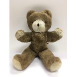 A vintage Wendy Boston musical teddy bear.