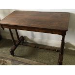 A Rosewood Victorian stretcher base table the rect
