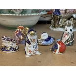 Six Royal Crown Derby paperweights including pengu