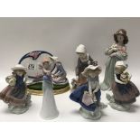 A collection of seven Lladro figures of maidens be