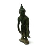 A miniature bronze figure of a Thai bronze Buddha.