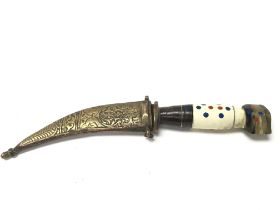 A North African knife with a decorated handle and