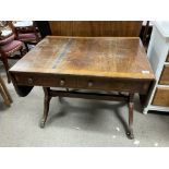 A Regency mahogany veneered sofa table.