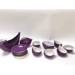 A contemporary Cmielow polish purple tea set.