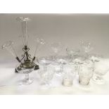 A collection of glassware comprising a four branch