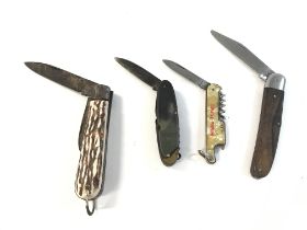 Four German pocket knives including early 20th cen