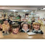 A large collection of Doulton character jugs inclu