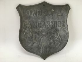 A lead fire insurance plaque marked for London & L