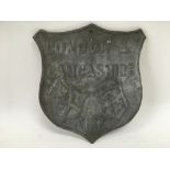 A lead fire insurance plaque marked for London & L