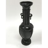 A small bronze vase -