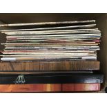 Two boxes of records by various artists.