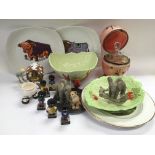 A collection of ceramics and glass comprising a li