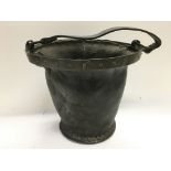 A leather fire bucket.