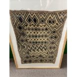 A framed Kuba cloth.