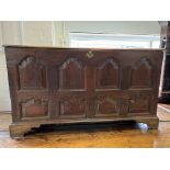 An 18th Century oak English coffer inset with a do