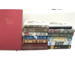 A collection of Folio Society books including 'the