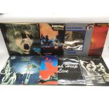Eight Uriah Heep LPs comprising 'Very Eavy Very Um