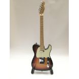 A 2007 USA Fender Telecaster in classic sunburst f