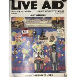 An original Live Aid poster and program plus the B