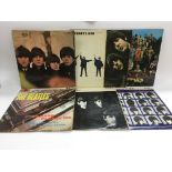 Seven Beatles LPs comprising mainly 1960s pressing