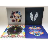 Three Coldplay LPs and an EP comprising 'Myloxylot