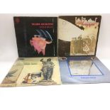 Four early pressings of 1970s rock LPs comprising