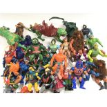 A Collection of Masters of the Universe Figures An