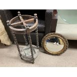 An oak stick stand and a circular gilt mirror, no