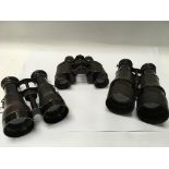 Three pairs of vintage binoculars including one pa