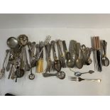 A bag of mixed silver plated cutlery.