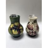 Two small moorcroft vases decorated flower head an