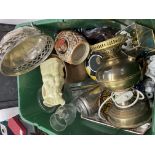 A large box containing an interesting assortment of silver plate, ceramics and a repro oil lamp