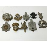 10 British army cap badges.