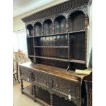 A large 19th century welsh carved oak dresser. 2.3