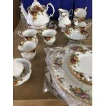 A royal Albert part tea set in the country rose pa