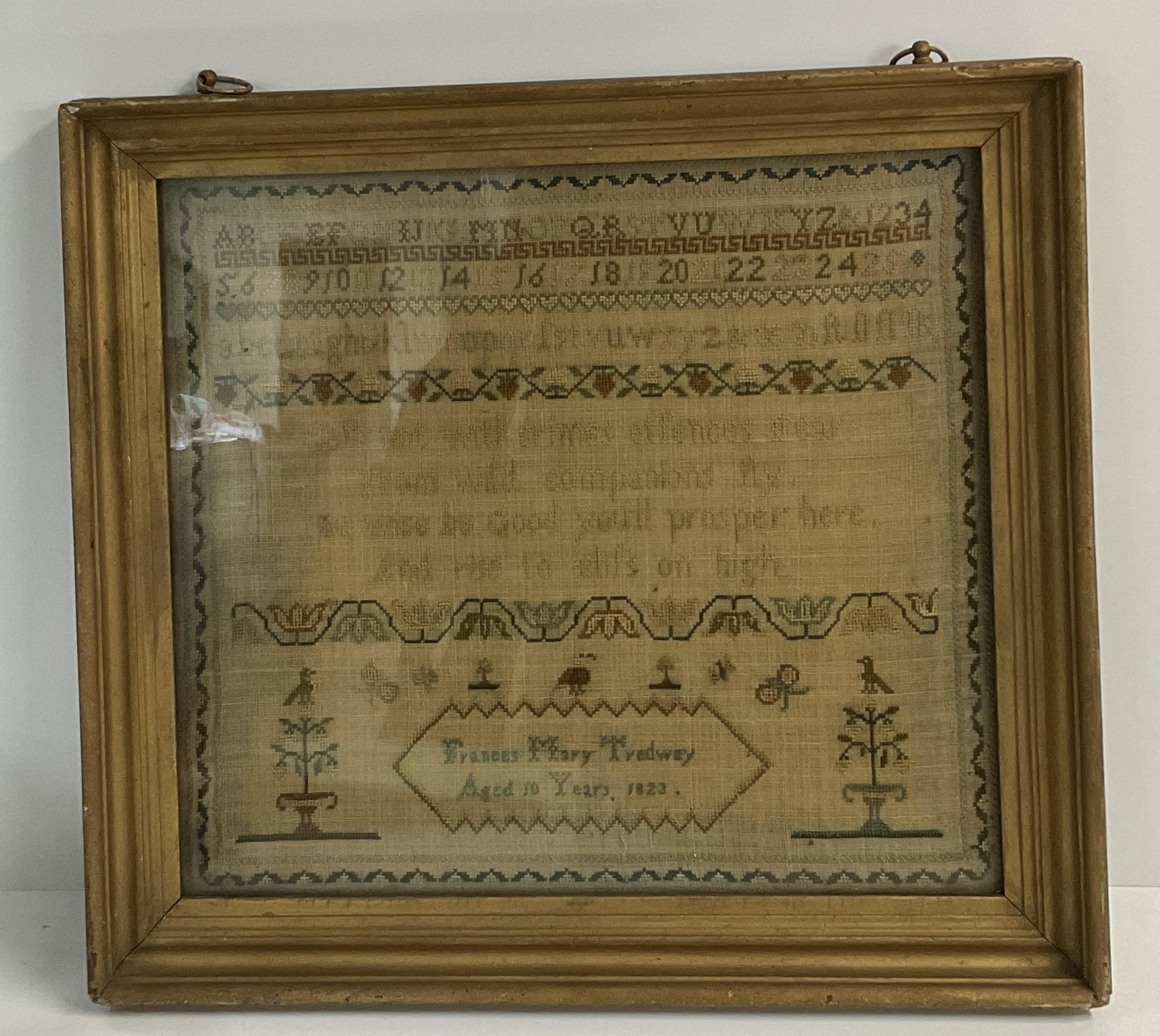 A gilt framed Victorian childâ€™s sampler by Franc