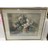 A framed watercolour painting of flowers in a vase signed by Trevor Chamberlain (b. 1934) dated